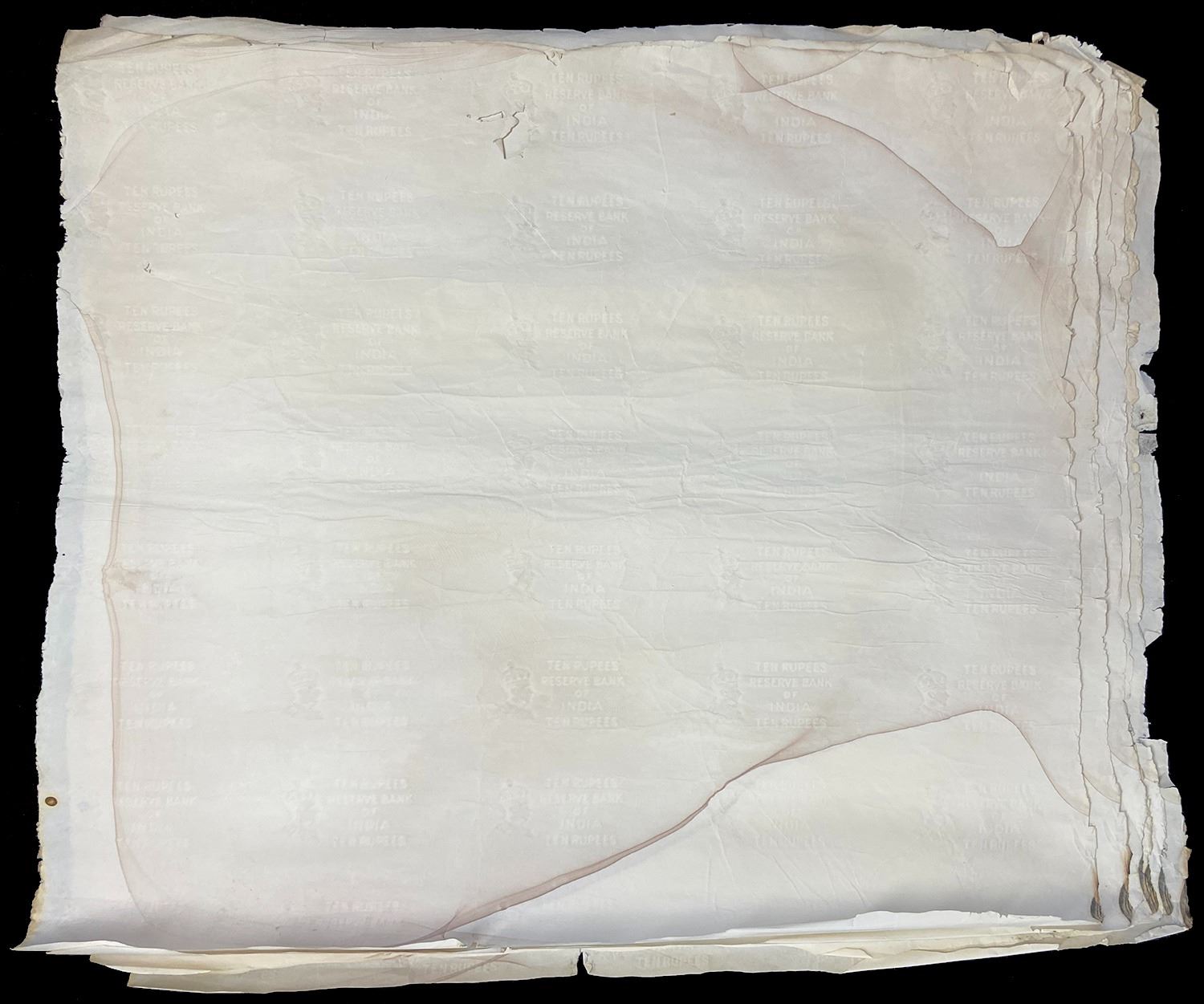 Large lot of 6 uncut sheets of India 10 rupees bank note paper.