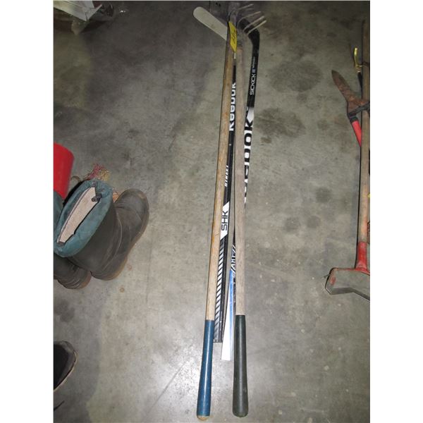 2 HOCKEY STICKS, HOE, RAKE