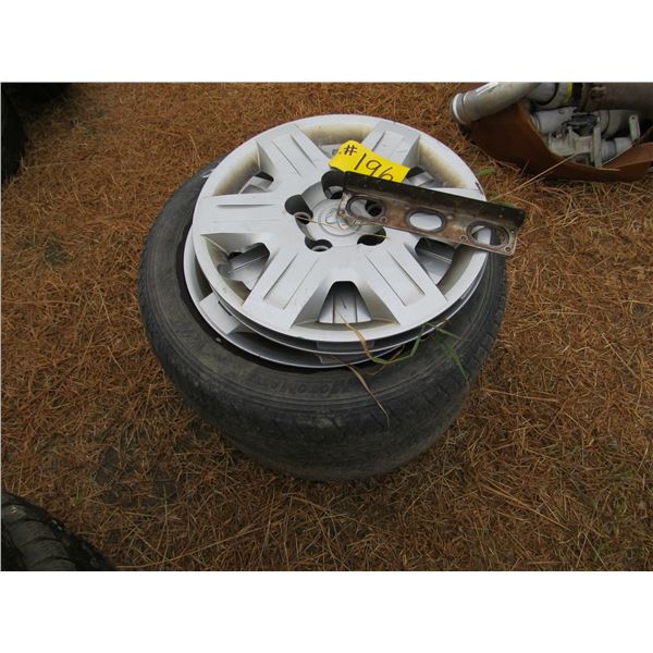 2 - 205/65/15 TIRES ON DODGE RIMS C/W CENTRE CAPS