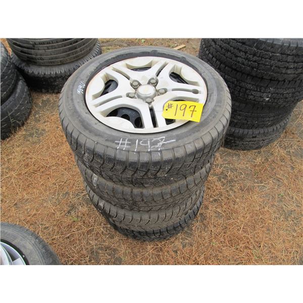 4 - 195/65/15 TIRES ON 5 BOLT CHEV RIMS