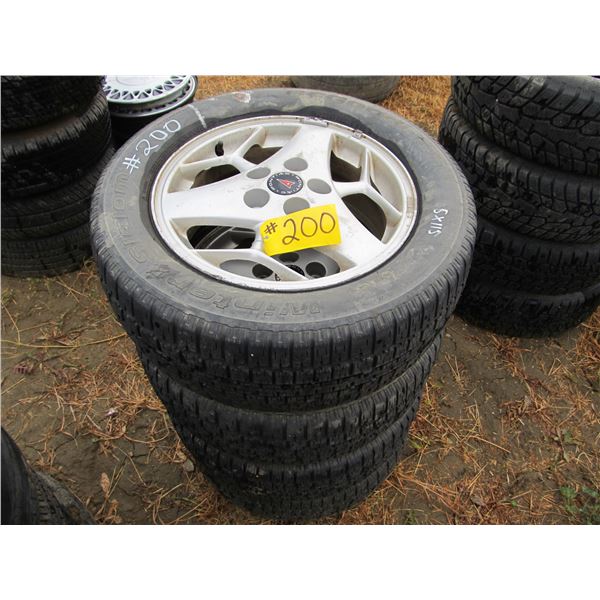 4- BF GOODRICH 225/60/16 TIRES ON PONTIAC RIMS