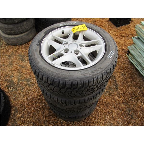 4- 205/55/16 BLIZZAK TIRES ON 5 BOLT OFF A BMW