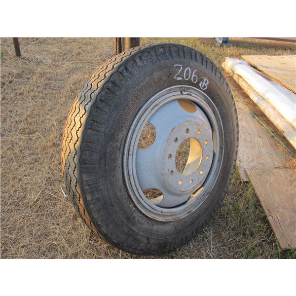750 X 20 STEERING TIRE ON BUD RIM