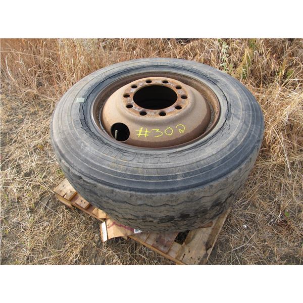 2 - 11 X 24.5 TIRES ON BUD RIMS (SHOWING SIGNS OF CRACKING)