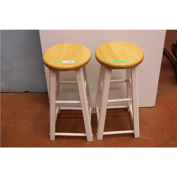 Two wooden bar stools - 25  tall - 12  round