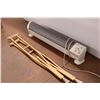 Image 2 : Baseboard Heater and Wooden Crutches