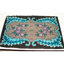 PRIMITIVE HOOKED RUG