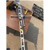 Image 1 : Bar clamp, level, tire iron and pick axe