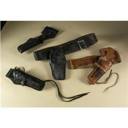 COLLECTION OF TOOLED LEATHER GUN HOLDERS