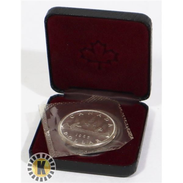 1965 CANADIAN SILVER DOLLAR STILL IN ORIG MINT BAG