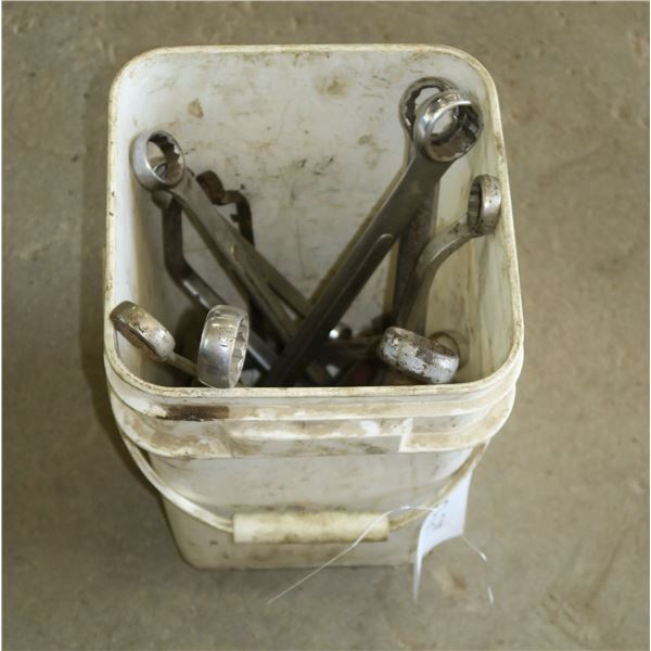 bucket of various size wrenches
