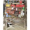 Image 1 : workstation 50"T x 44"W x 32"D w/ large quantity of stems, valves, patches, etc