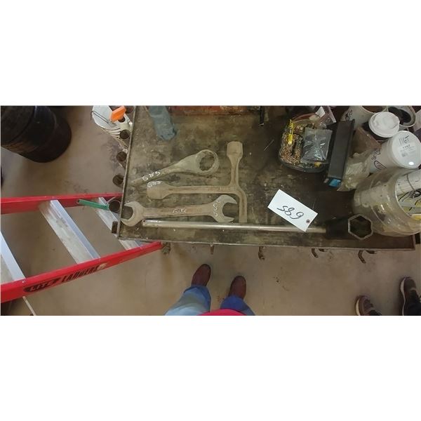 assortment of wrenches, nut breaker