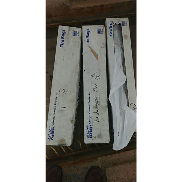 2 full, 1 partial boxes of tire bags