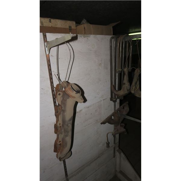 lot of auto parts -exhuast manifolds, tow hooks, u-bolts