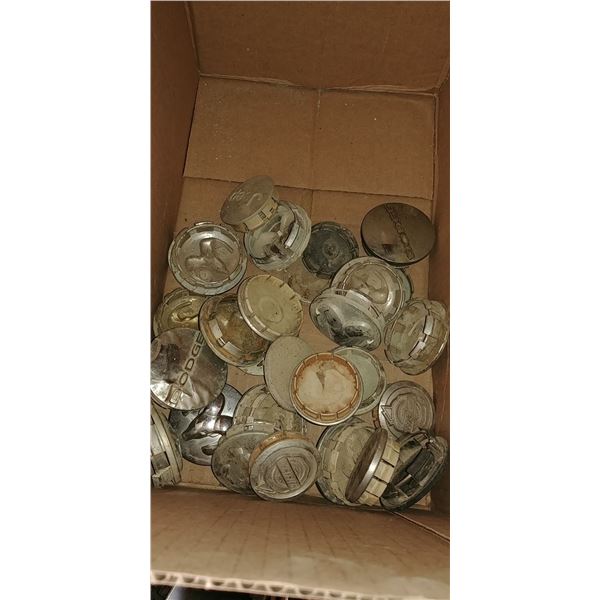 9 BOXES OF MISC CAPS AND COVERS