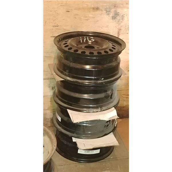 4 NEW 4 BOLT FORD FOCUS RIMS, STEEL