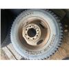 Image 2 : 1 tire & 8 bolt rim 8.75xR 16.5 LT