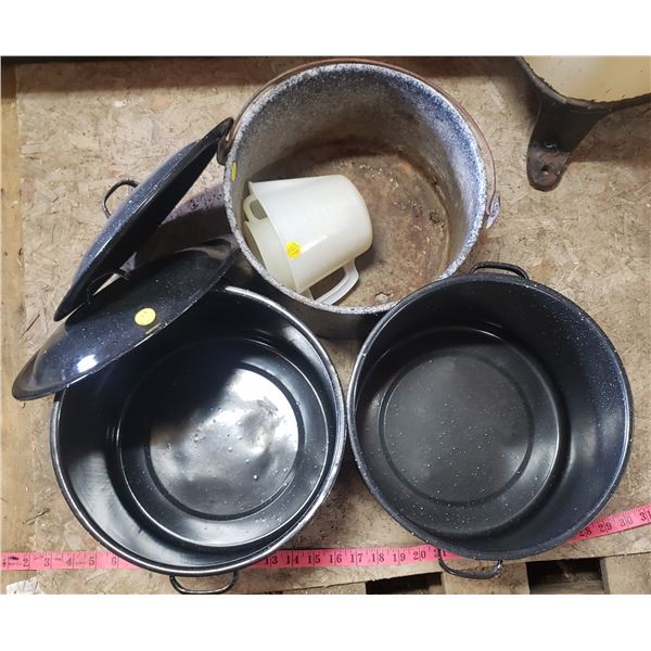 two large pots good for canning older decorator pot with some holes measuring cups