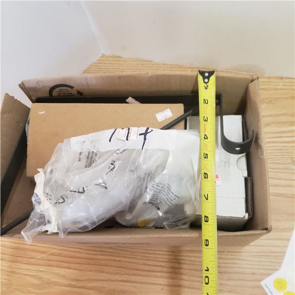 large lot box of misc. items is lot of single cabinet pulls and knobs ,