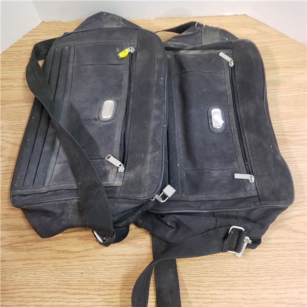 2 black carry on bags