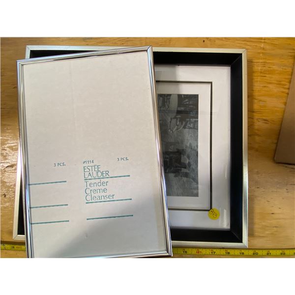 2 silver colour frames 1 has no glass