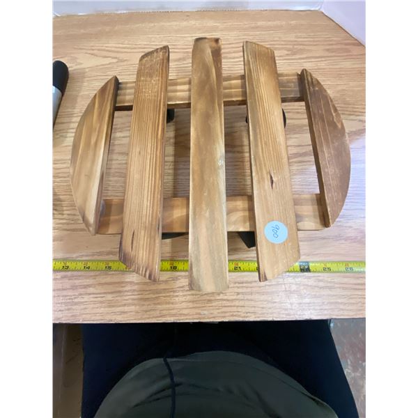 Plant stand on swivel wheels