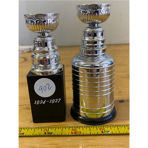 2X Stanley Cup 1924-1927, 1948-1957 Bottom of large cup has years.  plastic