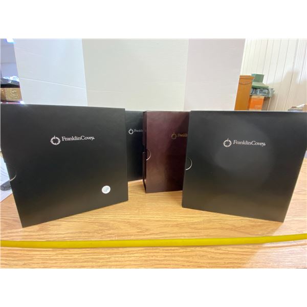 4 Franklin Covey Binders Storage Binders Heavy duty with case sleeve 3 black, 1 brown.