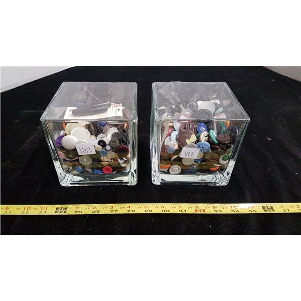 Two containers of vintage buttons