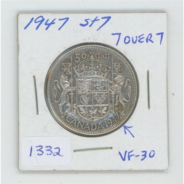1947 Straight 7 Left Silver 50 Cents. Coin displays a 7 Over 7 in the date. VF-30. Nice.