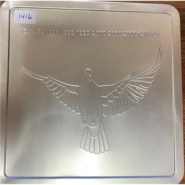 1999-2000 Official Millennium Keepsake includes 2 postage stamps and a Canada Post 2000 Dove token. 