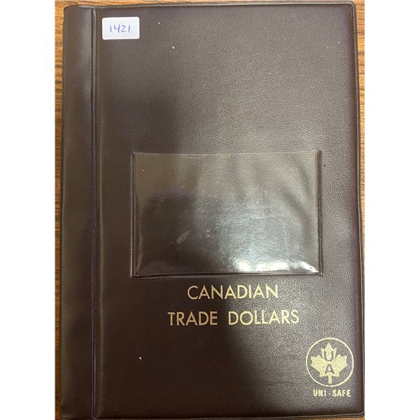 Canadian Trade Dollar stock book. Made by Uni-Safe. Houses 36 coins or tokens.
