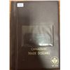 Image 1 : Canadian Trade Dollar stock book. Made by Uni-Safe. Houses 36 coins or tokens.