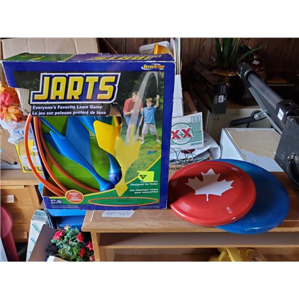 Jarts & 2 frisbees