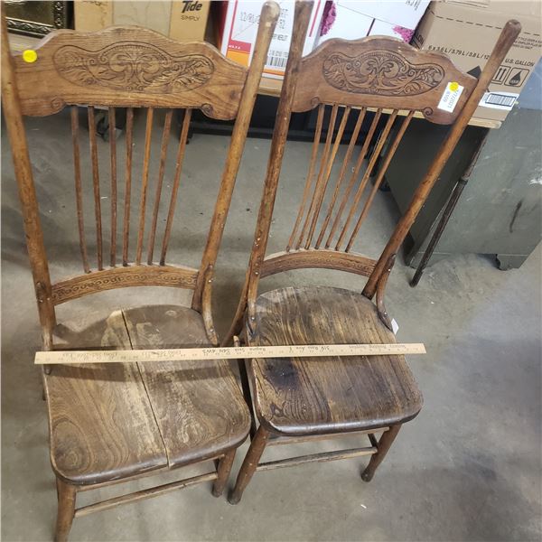 Two antique chairs (one is split ) old hard wood chairs