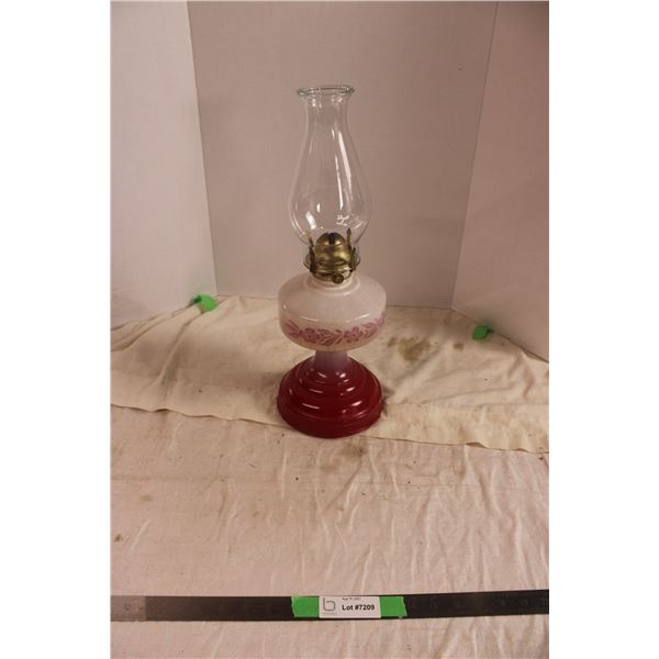 red coal oil lamp
