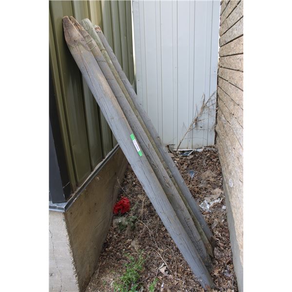 4 wooden poles 71" long