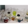 Image 2 : Kitchenware, cups, mugs, plastic pitchers, 1 pyrex cup, jars