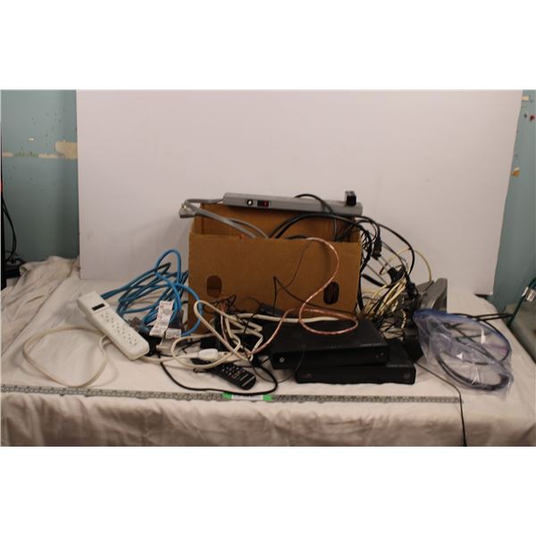 Box of electronics, cables, power bars, misc