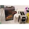 Image 2 : toaster, tupperware, can opener, kitchen items, wine container with contents