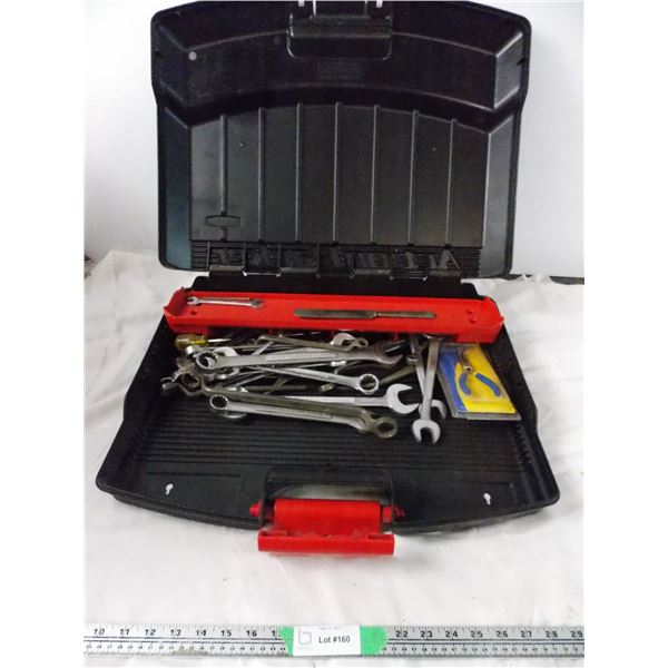 Tool box with assorted wrenches and pliers