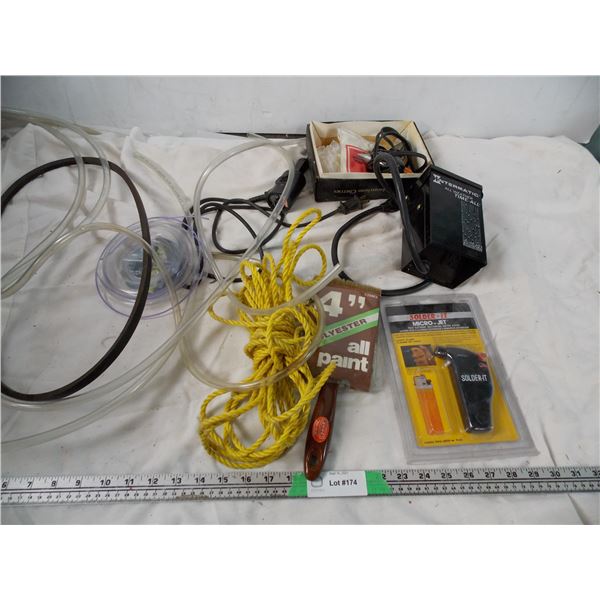 all weather timer, hot glue gun, rope, brush, tubing, misc