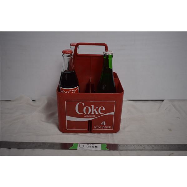 Coca Cola Crate with 4 full bottles - one grand canyon coke bottle