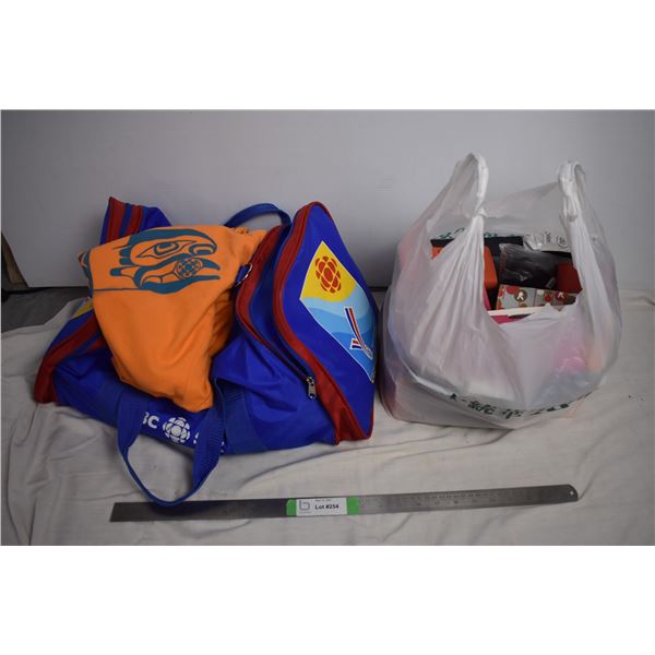 CBC radio duffle bag (victoria 94) with advertising clothes + bag of old cell phone cases