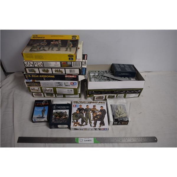 Plastic Soldier army figures (boxes empty or partially used, mainly just body parts on the trees)