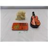 Image 1 : Ceramic eskimo , math set + violin shaped liquor bottle