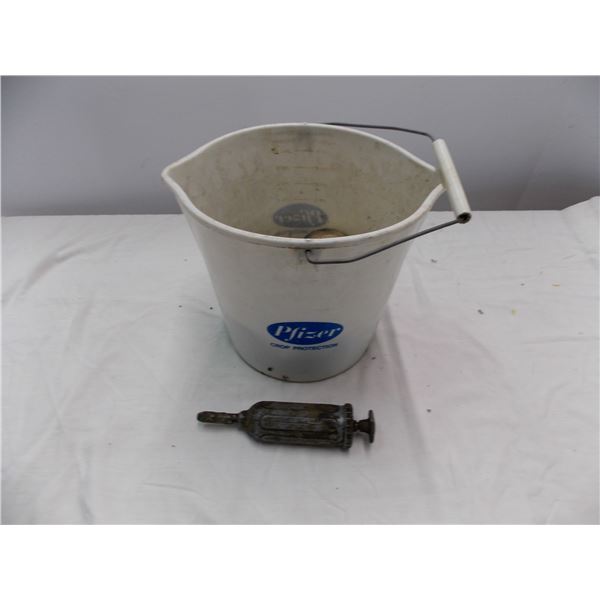 Bucket of old hockey pucks + misc