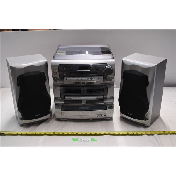 New Curtis Stereo System. Tape, CD, radio and vinyl player. Comes with remote. 13"x14"x15.5"