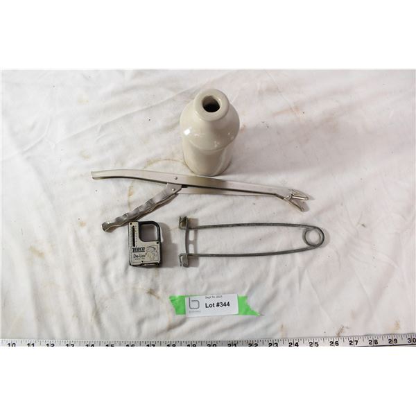 Fishing supplies and a small Jug. Fish scale, mouth opener, long pliers included. 5" jug.